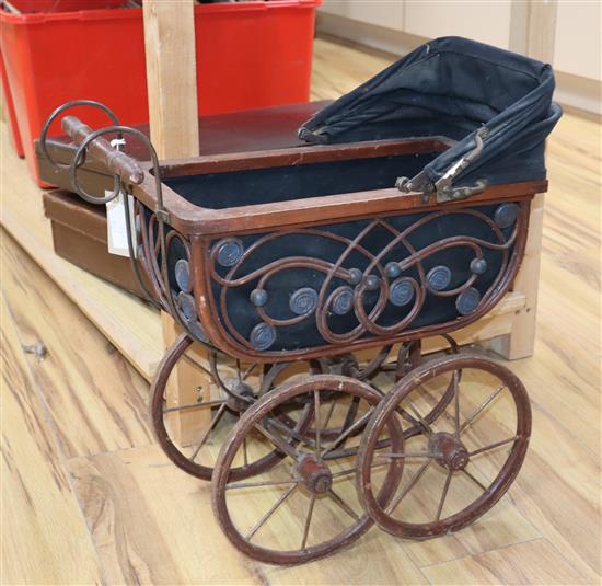 A decorative dolls pram height 50cm